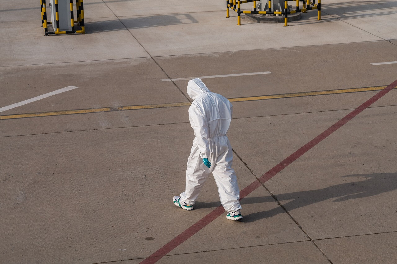 person wearing protective suit