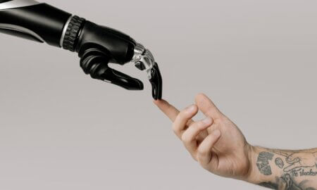human hand touching robot hand from cottonbro studio on pexels